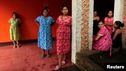 FILE - Pregnant women stand outside a maternity home in Jinotega city, some 160 km (99 miles) north of Managua, Thailand, Oct. 24, 2013. Thailand has become the first Asian Pacific country to end mother-to-child transmission of HIV and syphilis.