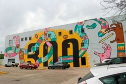 This mural celebrating New Orleans' tricentennial is among nearly two dozen created through Neal Morris's NOLA Murals Project after Morris sued New Orleans to overturn its murals regulations.
