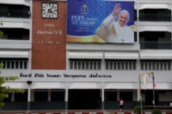 A banner with portrait of Pope Francis is displayed inside St. Joseph Convent School ahead of Pope's visit to Thailand, in Bangkok, Nov. 9, 2019.