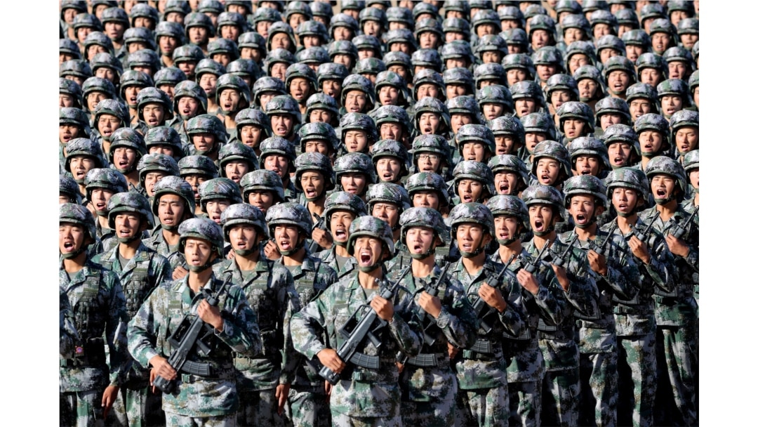 FILE - Soldiers of China's People's Liberation Army (PLA) get ready for the military parade to commemorate the 90th anniversary of the foundation of the army at Zhurihe military training base in Inner Mongolia Autonomous Region, China, July 30, 2017.