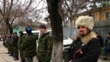 Pro-Russian irregulars form self defense units in Crimea's capital Simferopol, on March 2, 2014. (E. Arrott/VOA)