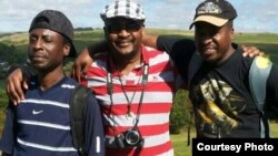 Nathan Sipho Banana (center) with his brothers posing for a photo. (Photo By Nathan Sipho Banana)