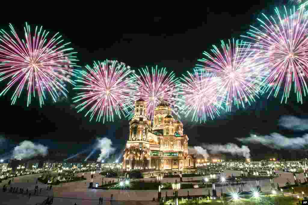 Fireworks explode over the Cathedral of Russian Armed Forces during the Spasskaya Tower military music festival in Kubinka, outside Moscow.