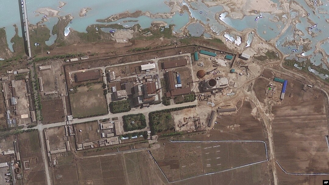 FILE - Satellite image provided by GeoEye shows the area around the Yongbyon nuclear facility in Yongbyon, North Korea. The U.S.-Korea Institute at Johns Hopkins School of Advanced International Studies said shows that North Korea has resumed building work on a reactor after months of inactivity at the site. 