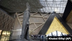 King Ramses II statue is displayed at the Grand Egyptian Museum in Giza, Egypt, Tuesday, Oct.15, 2024. (AP Photo/Khaled Elfiqi)