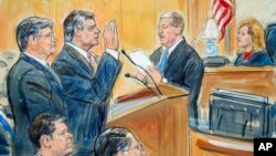 FILE - This courtroom sketch depicts former Donald Trump campaign chairman Paul Manafort (C) and his defense lawyer Richard Westling (L) before U.S. District Judge Amy Berman Jackson,at federal court in Washington, Sept. 14, 2018.