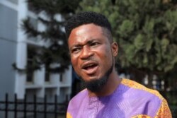 Onyeka Oghuaghamba, 43, one of the 47 men charged with public displays of affection with members of the same sex, speaks to the media at the Federal High Court in Lagos, Nigeria, Feb 5, 2020.