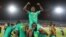 L'équipe du Sénégal après sa victoire contre la Tunisie en demi-finale de la CAN-2019 au Caire le 14 juillet 2019.