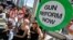 Protesters hold signs as they call for a reform of gun laws three days after the shooting at Marjory Stoneman Douglas High School, at a rally in Fort Lauderdale, Florida, Feb. 17, 2018. 