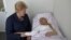 Lithuania's President Dalia Grybauskaite visits imprisoned former Ukrainian Prime Minister Yulia Tymoshenko in a hospital in the eastern Ukrainian city of Kharkiv, May 11, 2012. 