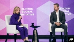 Hillary Clinton, 67th Secretary of State of the United States, left, speaks with. Matt Damon, right, in New York, Sept. 23, 2024.