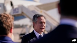 U.S. Secretary of State Antony Blinken speaks with members of the media as he arrives at Ben Gurion International Airport before departing for Riyadh, Saudi Arabia, in Tel Aviv, Israel, Oct. 23, 2024. 