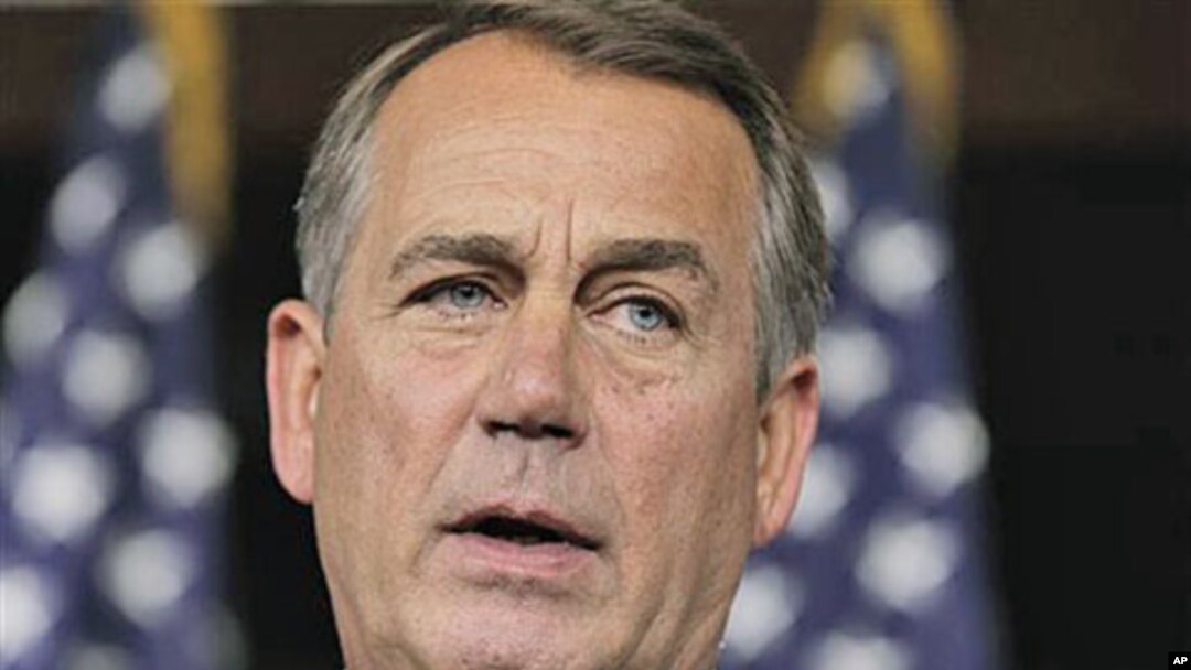 House Speaker John Boehner of Ohio speaks with reporters on Capitol Hill in Washington, DC, June 23, 2011