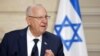 Presiden Israel Reuven Rivlin dalan konferensi pers bersama dengan Presiden Perancis Emmanuel Macron setelah makan siang di Istana Elysee, Paris, Kamis, 18 Maret 2021. (Foto: Ludovic Marin/Reuters)