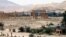 FILE - This file photo released on Sunday, May 17, 2015, by the Syrian official news agency SANA, shows the general view of the ancient Roman city of Palmyra, northeast of Damascus, Syria. 