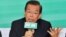 Former premier Frank Hsieh of the opposition Democratic Progressive Party speaks during a press conference in Taipei on October 1, 2012. 