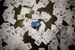 Israeli Prime Minister Benjamin Netanyahu's Likud Party election ballots are seen on the floor following Netanyahu's address to supporters at the party headquarters in Tel Aviv, Israel, March 3, 2020.