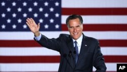Republican Presidential candidate, former Massachusetts Gov. Mitt Romney declares victory in the Wisconsin presidential primary, April 3, 2012, at the Grain Exchange in Milwaukee. 