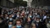 Angry restaurant and bar owners demonstrate in Marseille, southern France, to challenge a French government order to close all public venues as of Saturday to battle resurgent virus infections. 