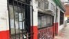 The storefronts of former Black-owned businesses remain shuttered in this Washington, D.C., neighborhood that was once the site of a thriving Black business community. (Chris Simkins/VOA)