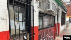 The storefronts of former Black-owned businesses remain shuttered in this Washington, D.C., neighborhood that was once the site of a thriving Black business community. (Chris Simkins/VOA)