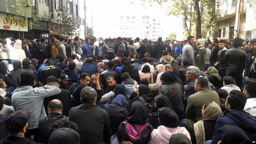 Protesters attend a demonstration after authorities raised gasoline prices, in the northern city of Sari, Iran, Nov. 16, 2019.