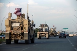 A convoy of U.S. vehicles is seen after withdrawing from northern Syria, in Erbil, Iraq, Oct. 21, 2019.