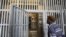 An Iranian man visits on Sept. 2, 2014 the "Qasr prison," a former prison hosting political prisoners that was turned into a museum in 2012 in the Iranian capital Tehran. 