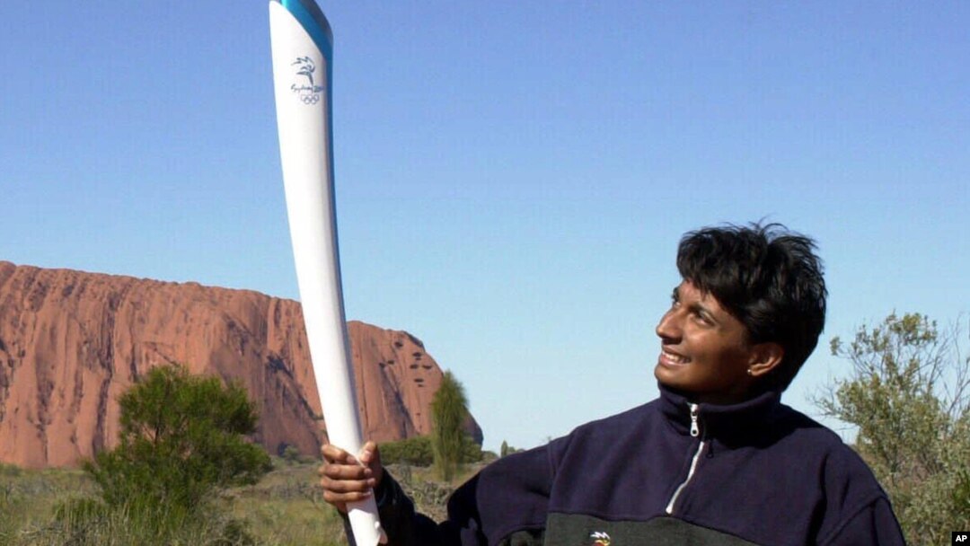 FILE - Then-Australian Olympic sprinter Nova Peris is seen in this June 7, 2000 file photo. She later became the first Aboriginal woman to win a seat in Australia's Parliament. 