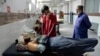 FILE - Injured men receive treatment at a hospital in Quetta, Pakistan, Oct. 11, 2024, following Thursday attack by gunmen in Balochistan province.