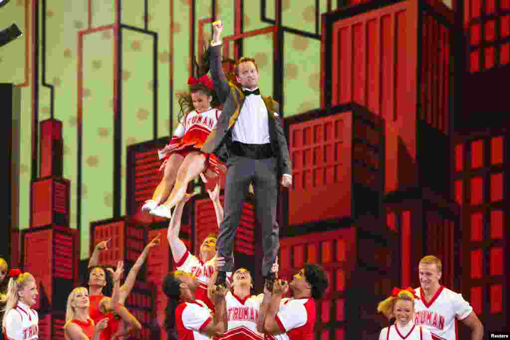 Actor Neil Patrick Harris performs with the cast of the musical &quot;Bring it On&quot; as he hosts the Tony Awards in New York, June 9, 2013. 