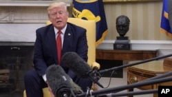 President Donald Trump speaks in the Oval Office of the White House in Washington, May 18, 2017.