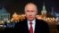In this photo released by Kremlin Press service via Sputnik agency, Russian President Vladimir Putin speaks during a recording of his annual televised New Year's message in the Kremlin in Moscow, Jan. 31, 2018.