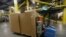 A robot carries boxes at the Amazon Fulfillment center in Robbinsville Township, New Jersey, Aug. 1, 2017.