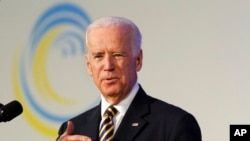 FILE - Vice President Joe Biden, shown at an energy summit last month in Washington, will be abroad when Israel's prime minister is scheduled to address Congress, his office says.