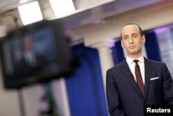 FILE - Senior White House Advisor Stephen Miller waits to go on the air in the White House Briefing Room in Washington, Feb. 12, 2017.