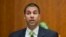 FILE - Federal Communication Commission Commissioner Ajit Pai speaks during a hearing in Washington.