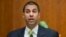 FILE - Federal Communication Commission Commissioner Ajit Pai speaks during a hearing in Washington.