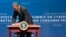President Barack Obama signs an executive order promoting private sector cybersecurity information sharing during a summit on cybersecurity and consumer protection, Feb. 13, 2015, at Stanford University in Palo Alto, California.