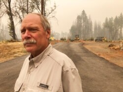 Paradise Town Councilman Steve Crowder stands on his property in Paradise, Calif., Sept. 10, 2020. Crowder lost his home in a 2018 wildfire that destroyed most of the town. But he has since built a new house.