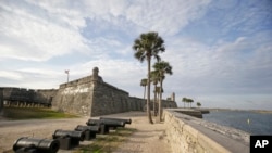 FILE - In this Feb. 3, 2015, photo, the Castillio de San Marcos fort, built over 450 years ago, is separated from the Matanzas River by a sea wall in St. Augustine, Florida. 