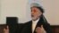 Afghanistan's President Hamid Karzai speaks during a district assembly gathering in Kabul, May 30, 2013. 