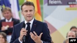 El presidente francés, Emmanuel Macron, asiste a un debate durante su visita al Festival de la Democracia (Demokratiefest) en Berlín, Alemania, el 26 de mayo de 2024.
