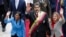 FILE - Venezuela's President Nicolas Maduro, then Constituent National Assembly President Delcy Rodriguez, left, and first lady Cilia Flores, wave as they arrive to the National Assembly, in Caracas, Venezuela, May 24, 2018. The Trump administration slapped financial sanctions Tuesday, Sept. 25, 2018, on four members of Maduro’s inner circle, including his wife, and Rodriguez who is now the nation’s vice president, on allegations of corruption.