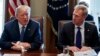 FILE - In this April 9, 2018, photo, Deputy Secretary of Defense Patrick Shanahan, right, listen as President Donald Trump speaks during a cabinet meeting at the White House, in Washington.