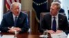 FILE - In this April 9, 2018, photo, Deputy Secretary of Defense Patrick Shanahan, right, listen as President Donald Trump speaks during a cabinet meeting at the White House, in Washington.