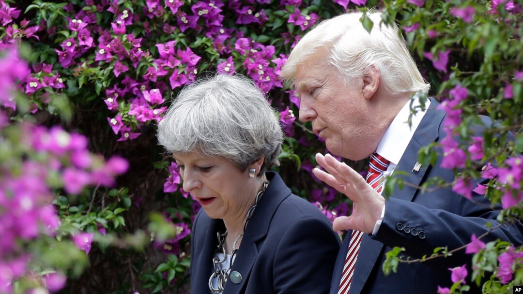 Britanska premijerka Tereza Mej i američki predsednik Donald Tramp na samitu G7 u Taormini (arhivska fotografija)