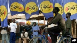 Supporters of the ruling Patriotic Salvation movement gather around flags of the party at one of the party offices in the Chadian capital, N'djamena. (File photo)