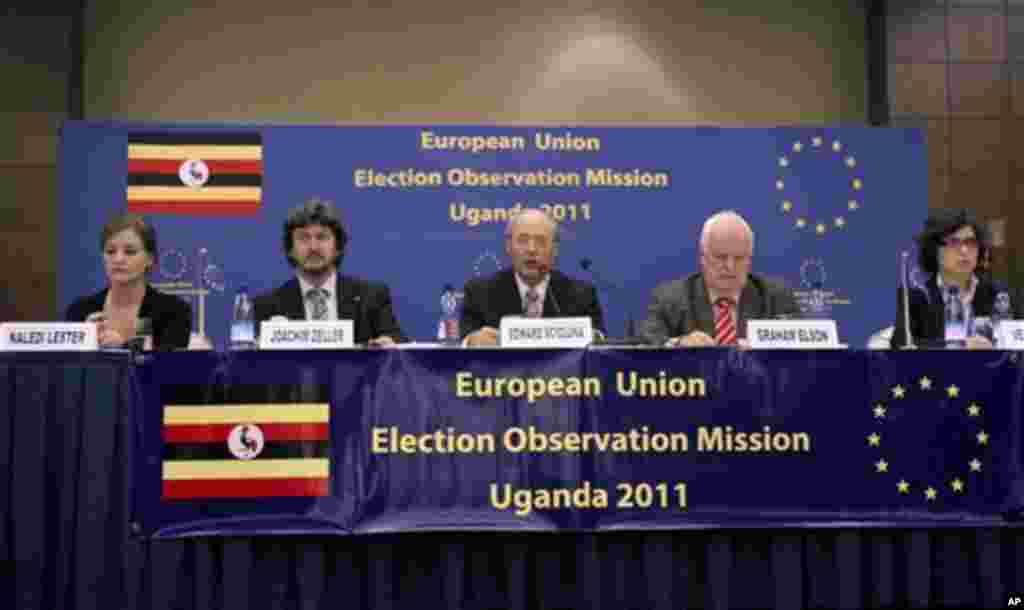 The European Union elections observation mission is seen during a conference in Kampala, Uganda. Sunday, Feb. 20, 2011. Chief observer Edward Scicluna, third left, said the election showed some improvement in those held in the 2006 however the electoral 