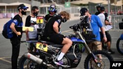 France's biker Arien Van Beveren arrives for a technical checkup in Jeddah, Saudi Arabia, on Jan. 1, 2021, ahead of the 2021 Dakar Rally, which this year will take place in Saudi Arabia from Jan. 3-15, 2021. 